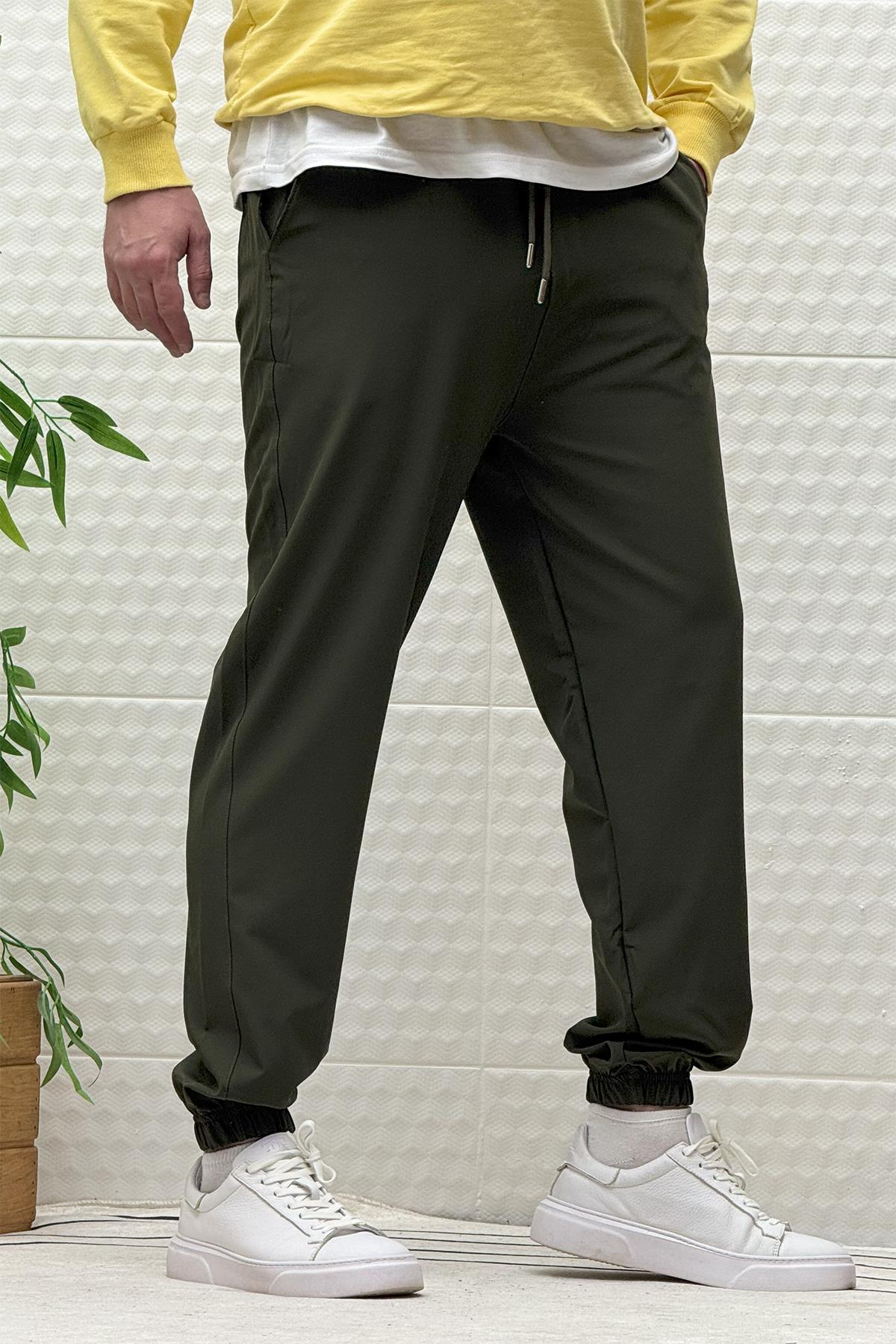 Erkek Full Likralı Paraşüt Kumaş Lastikli Jogger Pantolon - Haki Yeşil
