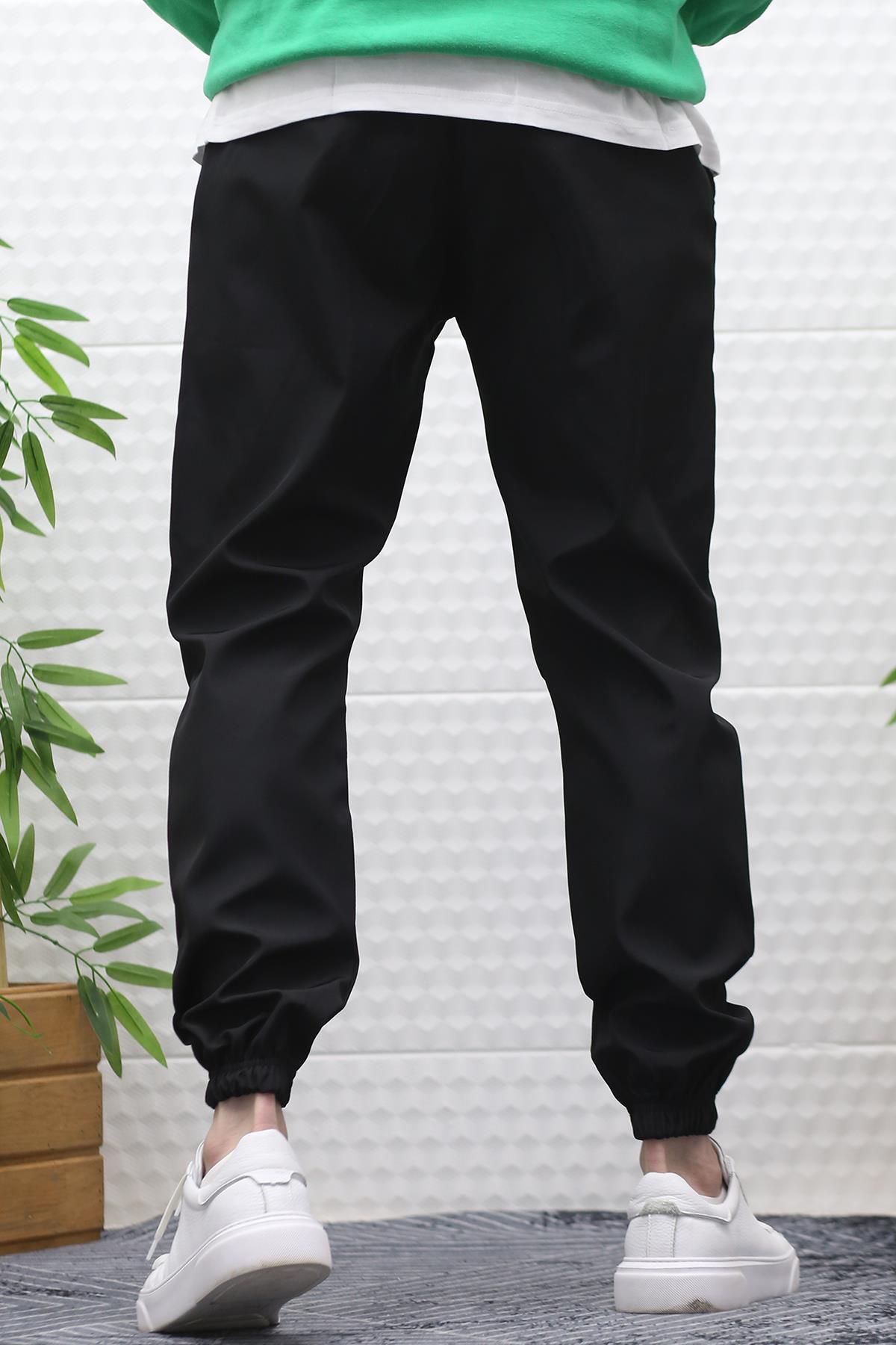 Erkek Jagger Pantolon Paraşüt Kumaş Su Tutmaz Rüzgar Geçirmez Diz Detaylı - Siyah