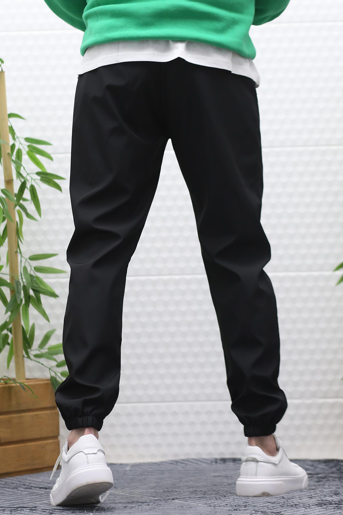 Erkek Jagger Pantolon Paraşüt Kumaş Su Tutmaz Rüzgar Geçirmez Paça Lastikli - Siyah