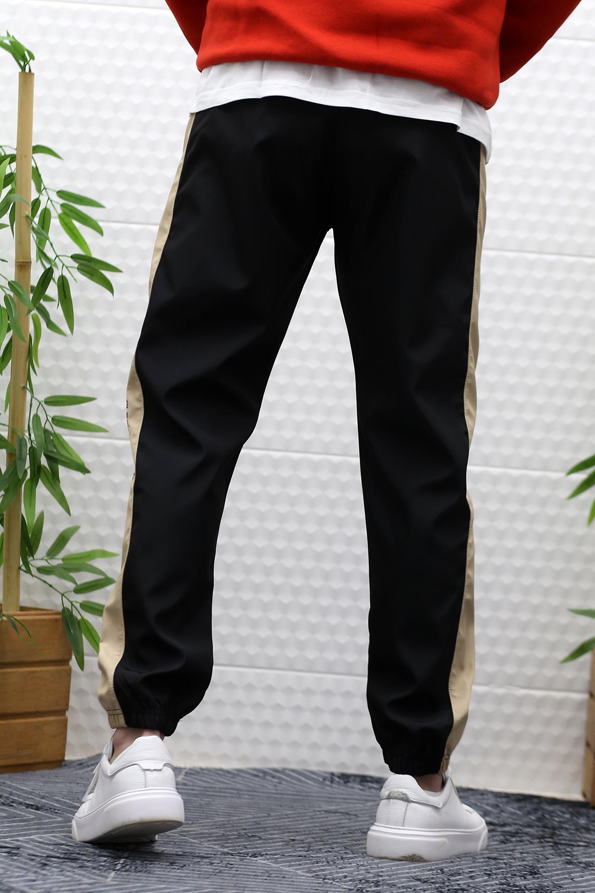 Erkek Jagger Pantolon Paraşüt Kumaş Su Tutmaz Rüzgar Geçirmez Yan Garnili - Siyah