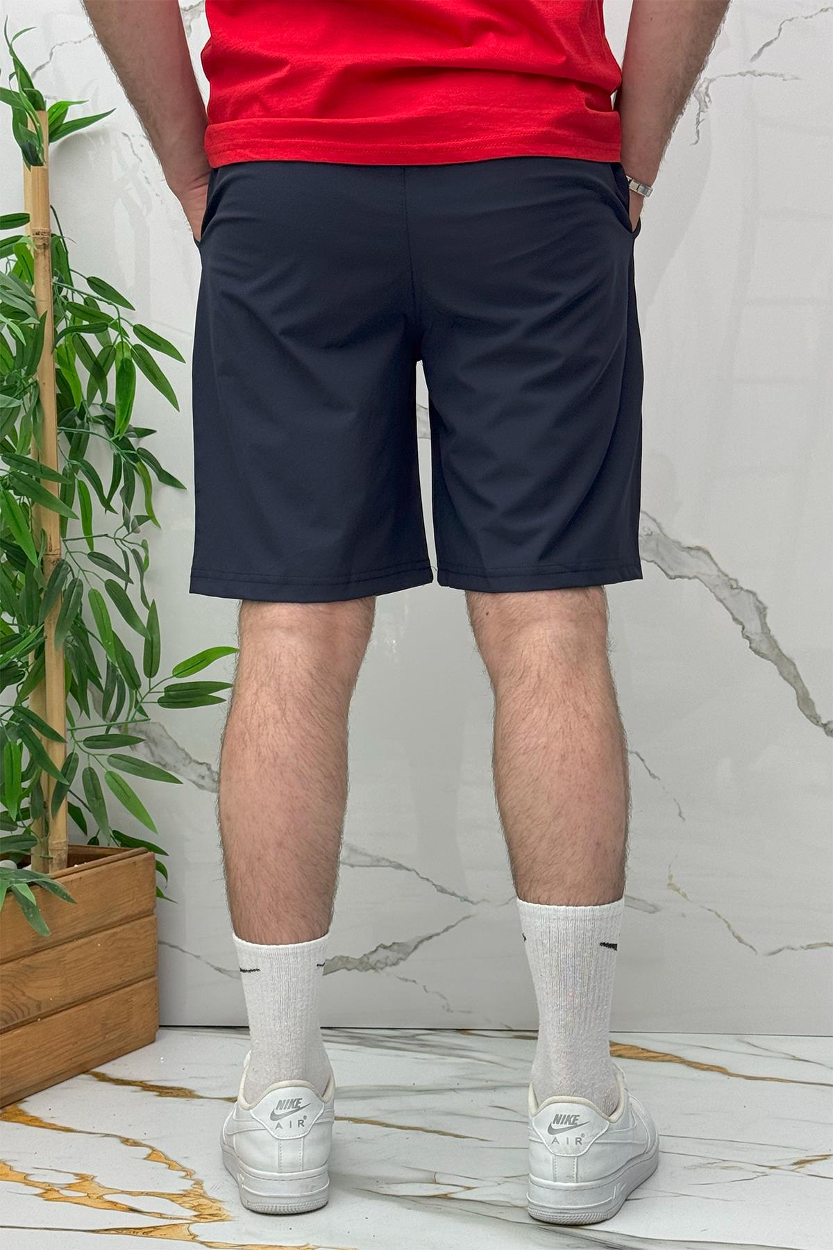 Erkek Likralı Rahat Kesim Tiril Tiril Paraşüt Kumaş Şort - Lacivert