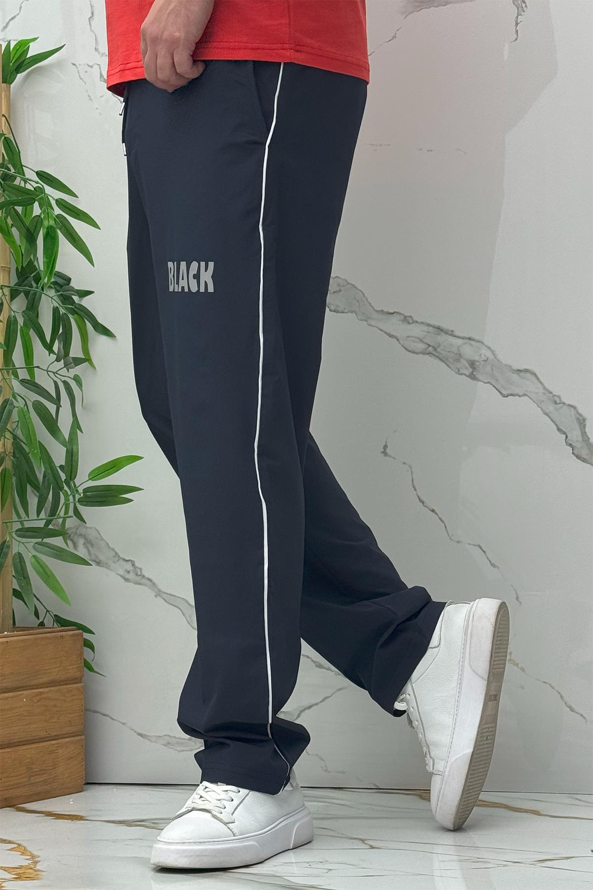 Erkek Yanları Biyeli Reflektör Baskılı Paraşüt Kumaş Baggy Pantolon - Lacivert