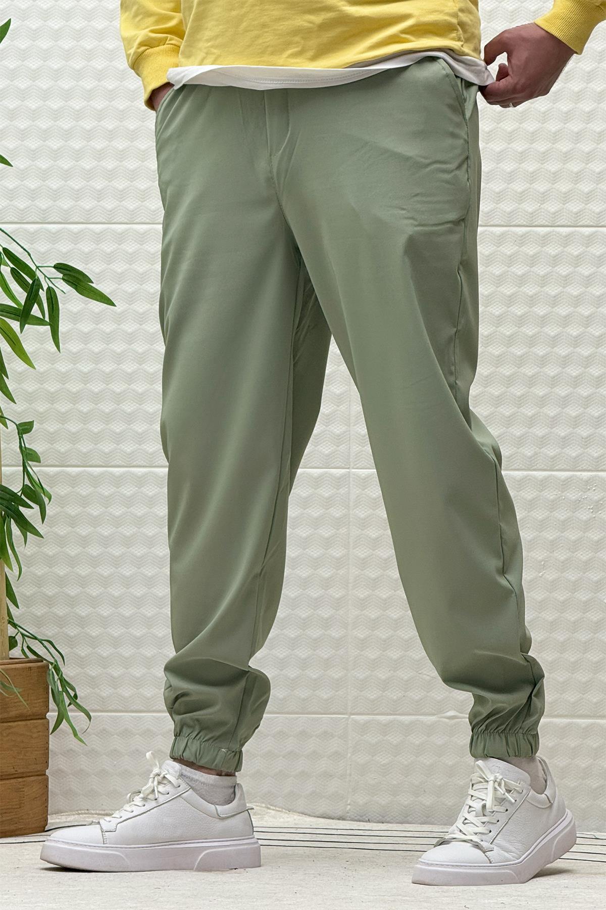 Erkek Full Likralı Paraşüt Kumaş Lastikli Jogger Pantolon - Su Yeşili