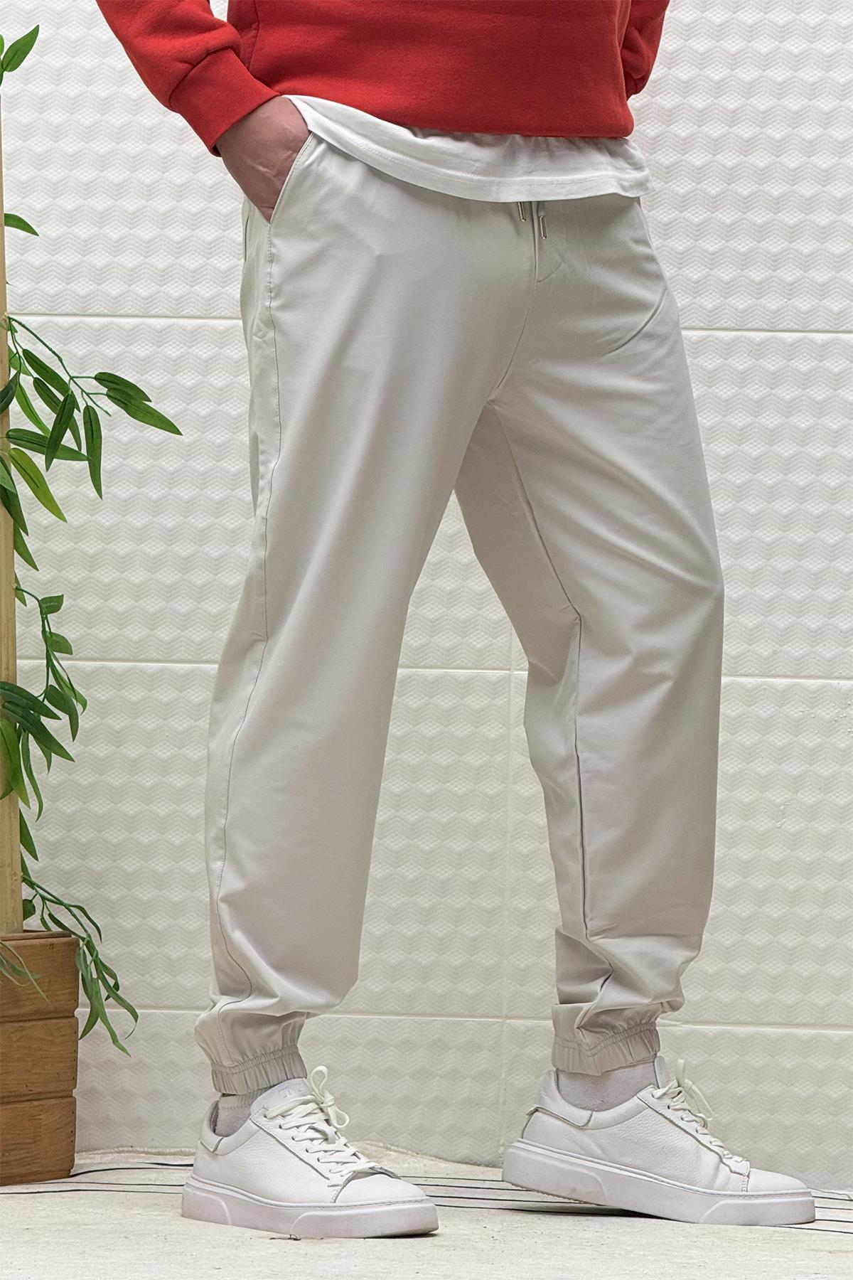 Erkek Full Likralı Paraşüt Kumaş Lastikli Jogger Pantolon - Açık Gri