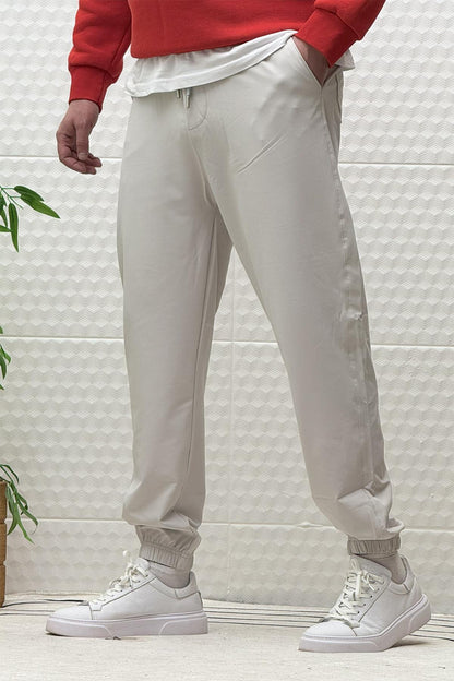 Erkek Full Likralı Paraşüt Kumaş Lastikli Jogger Pantolon - Açık Gri