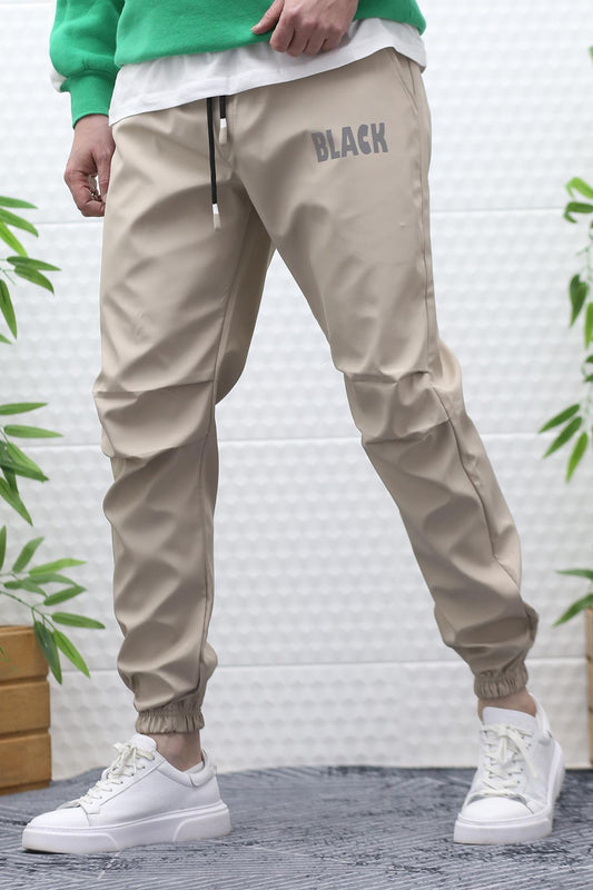 Erkek Jagger Pantolon Paraşüt Kumaş Su Tutmaz  Rüzgar Geçirmez Diz Detaylı - Bej
