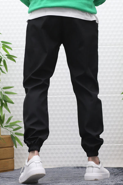 Erkek Jagger Pantolon Paraşüt Kumaş Su Tutmaz  Rüzgar Geçirmez Diz Detaylı - Siyah