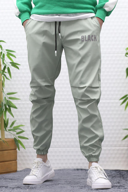 Erkek Jagger Pantolon Paraşüt Kumaş Su Tutmaz  Rüzgar Geçirmez Diz Detaylı - Su Yeşili