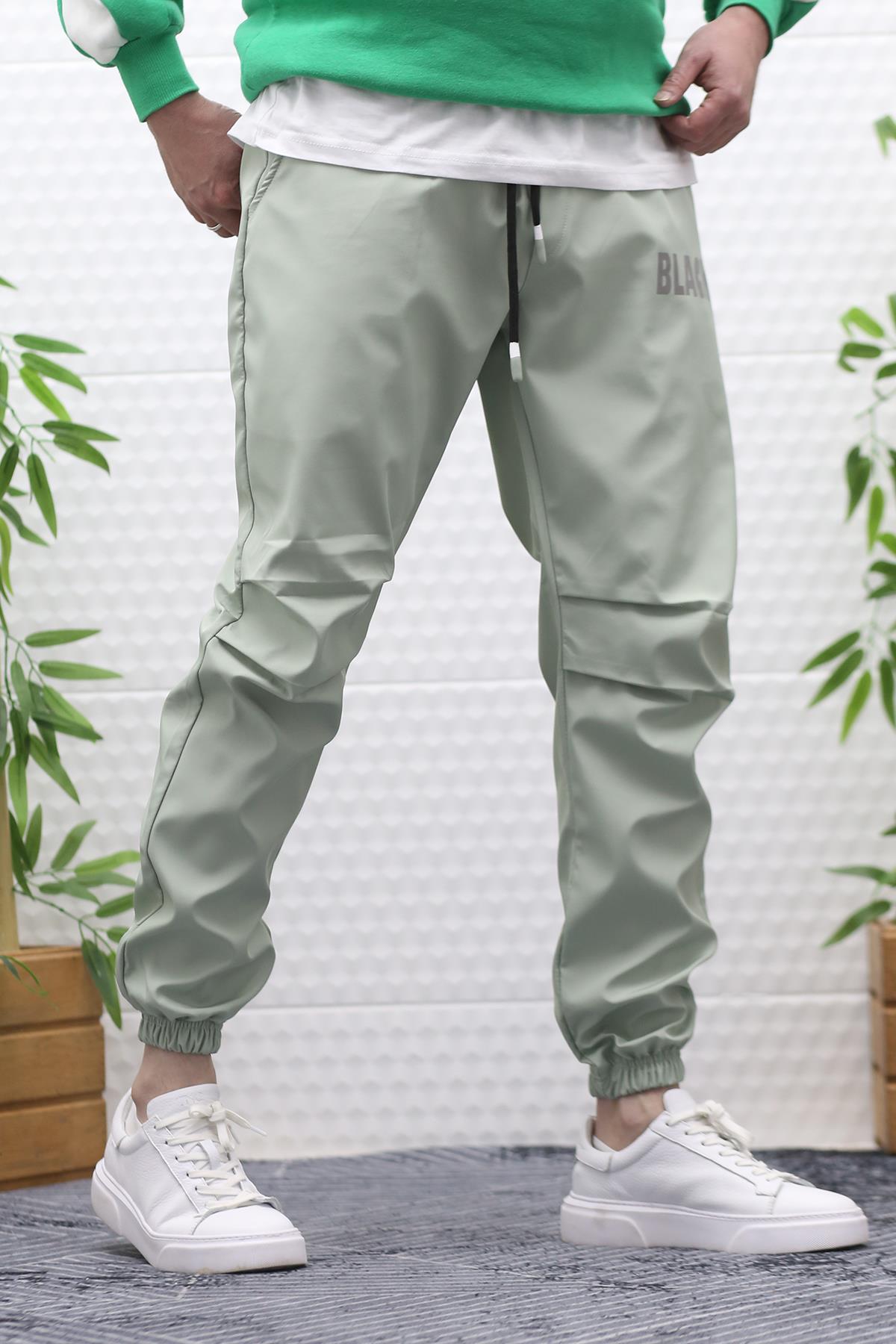 Erkek Jagger Pantolon Paraşüt Kumaş Su Tutmaz  Rüzgar Geçirmez Diz Detaylı - Su Yeşili