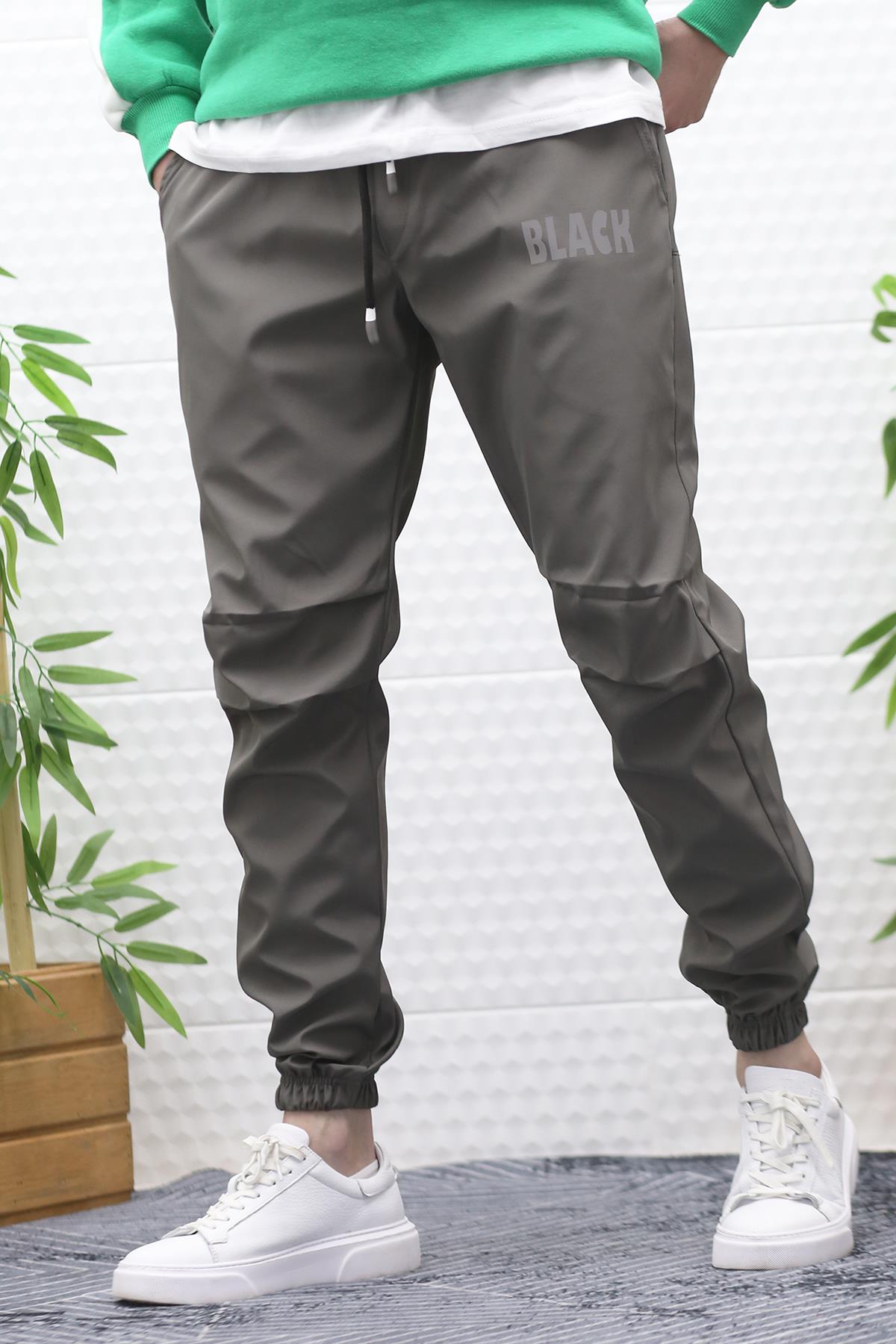 Erkek Jagger Pantolon Paraşüt Kumaş Su Tutmaz  Rüzgar Geçirmez Diz Detaylı - Füme