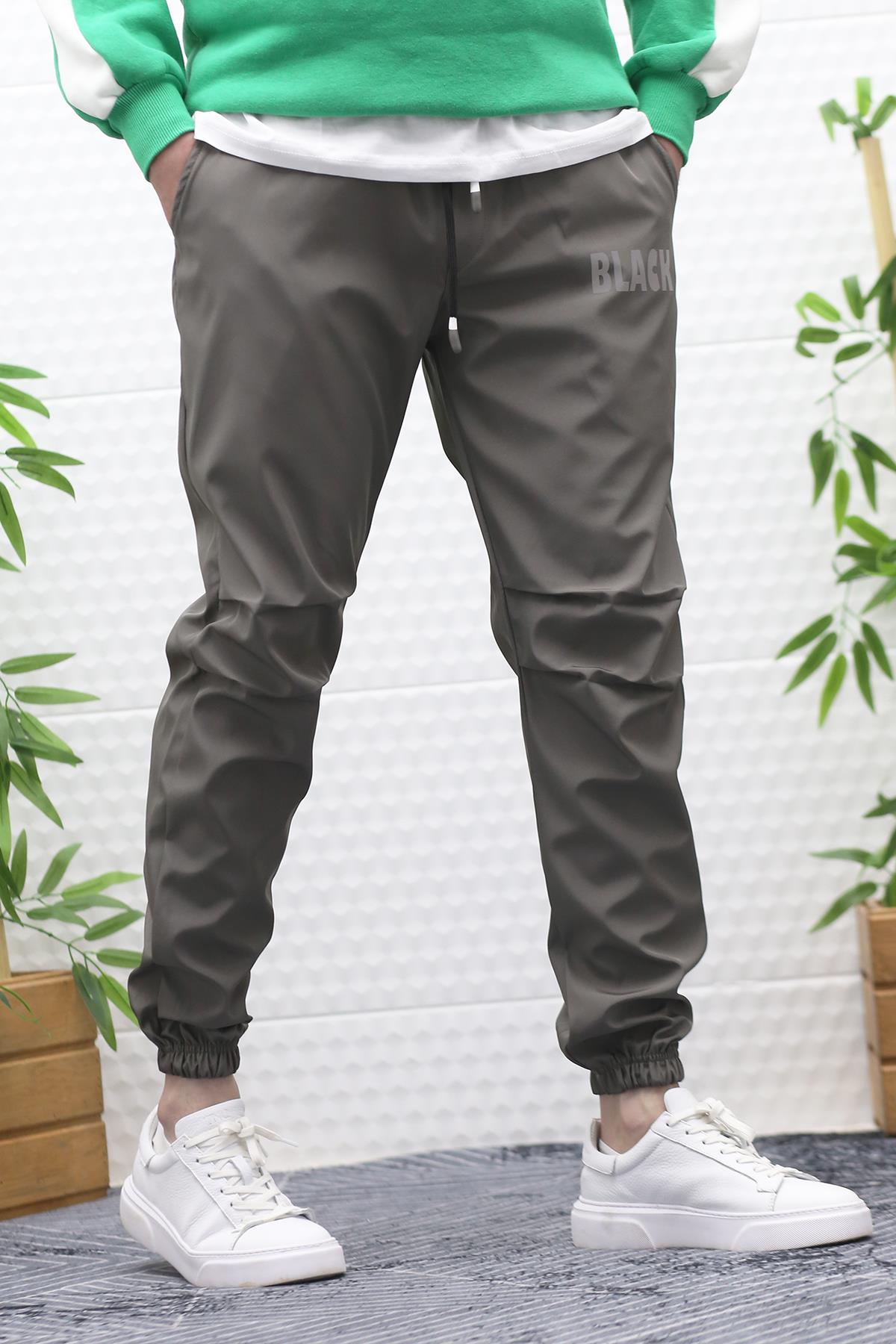 Erkek Jagger Pantolon Paraşüt Kumaş Su Tutmaz  Rüzgar Geçirmez Diz Detaylı - Füme