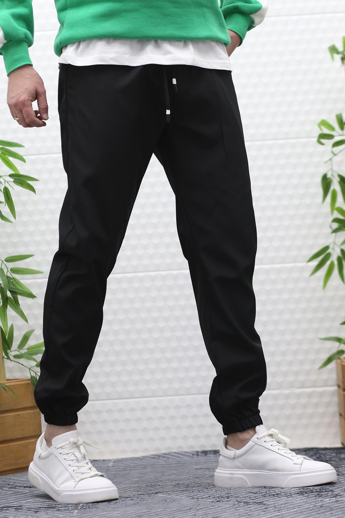 Erkek Jagger Pantolon Paraşüt Kumaş Su Tutmaz Rüzgar Geçirmez Paça Lastikli - Siyah