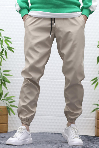 Erkek Jagger Pantolon Paraşüt Kumaş Su Tutmaz Rüzgar Geçirmez Paça Lastikli - Bej