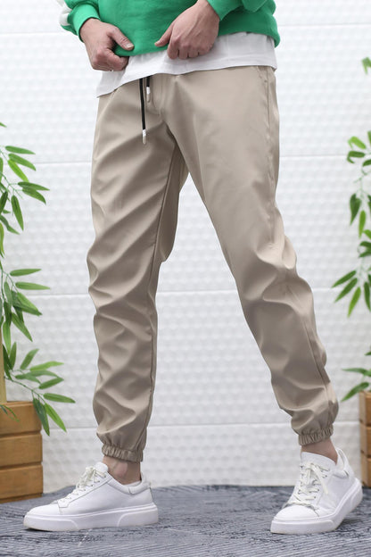 Erkek Jagger Pantolon Paraşüt Kumaş Su Tutmaz Rüzgar Geçirmez Paça Lastikli - Bej