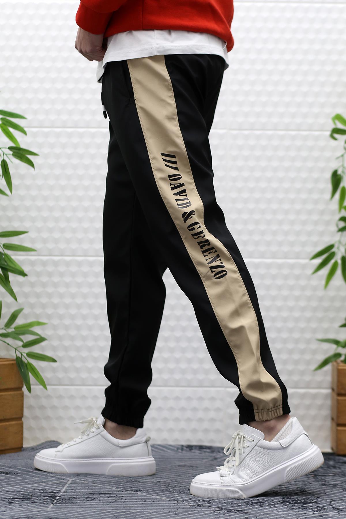 Erkek Jagger Pantolon Paraşüt Kumaş Su Tutmaz  Rüzgar Geçirmez Yan Garnili - Siyah