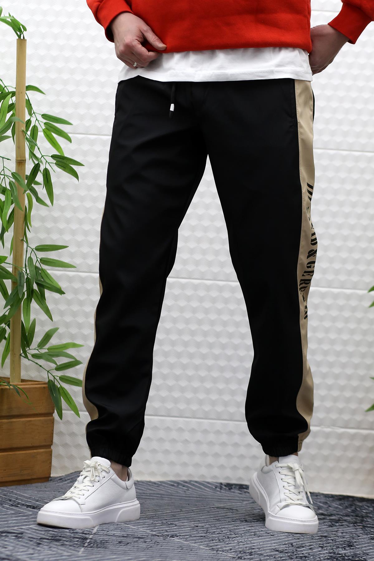 Erkek Jagger Pantolon Paraşüt Kumaş Su Tutmaz  Rüzgar Geçirmez Yan Garnili - Siyah