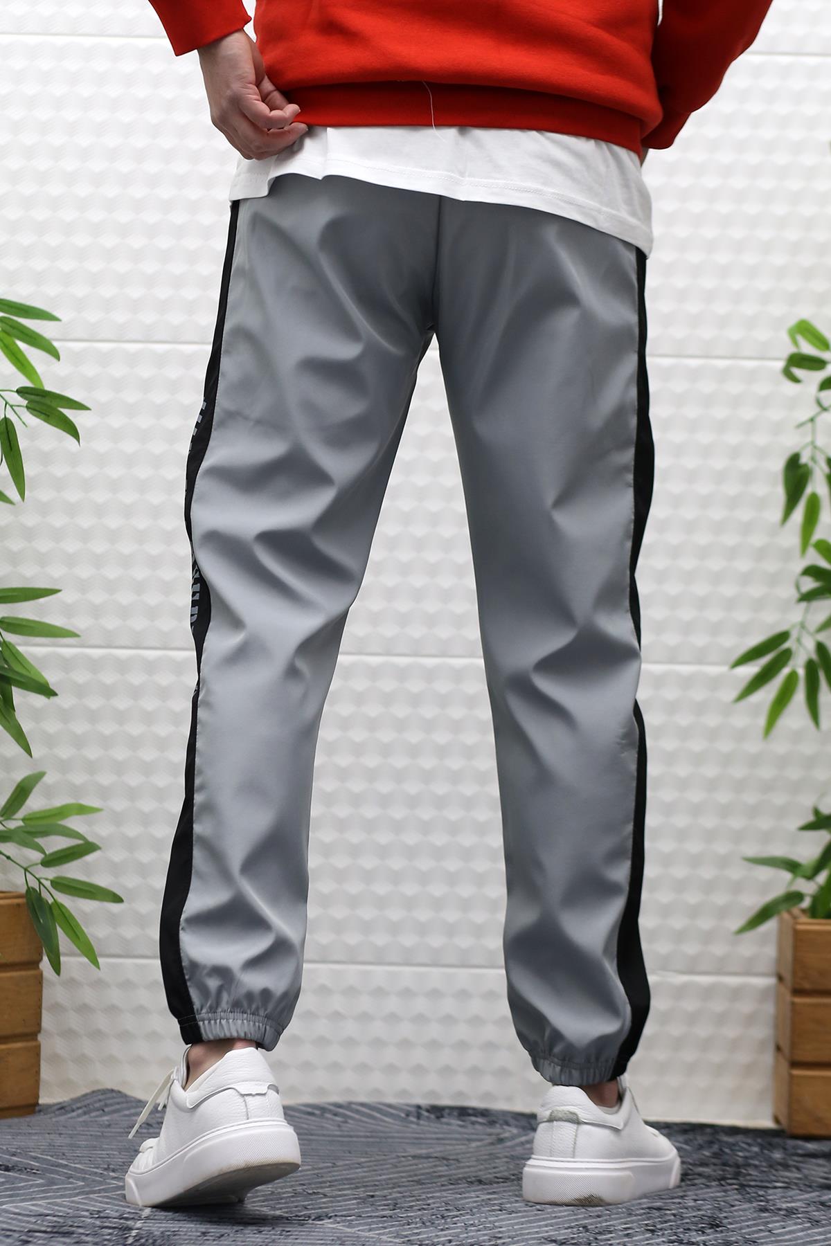 Erkek Jagger Pantolon Paraşüt Kumaş Su Tutmaz  Rüzgar Geçirmez Yan Garnili - Gri