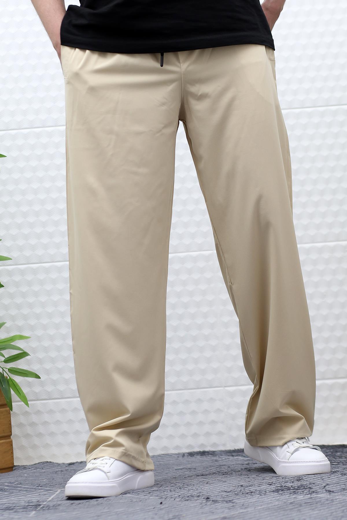 Erkek Likralı Baggy Pantolon Düz Paça Paraşüt Kumaş Pantolon - Bej