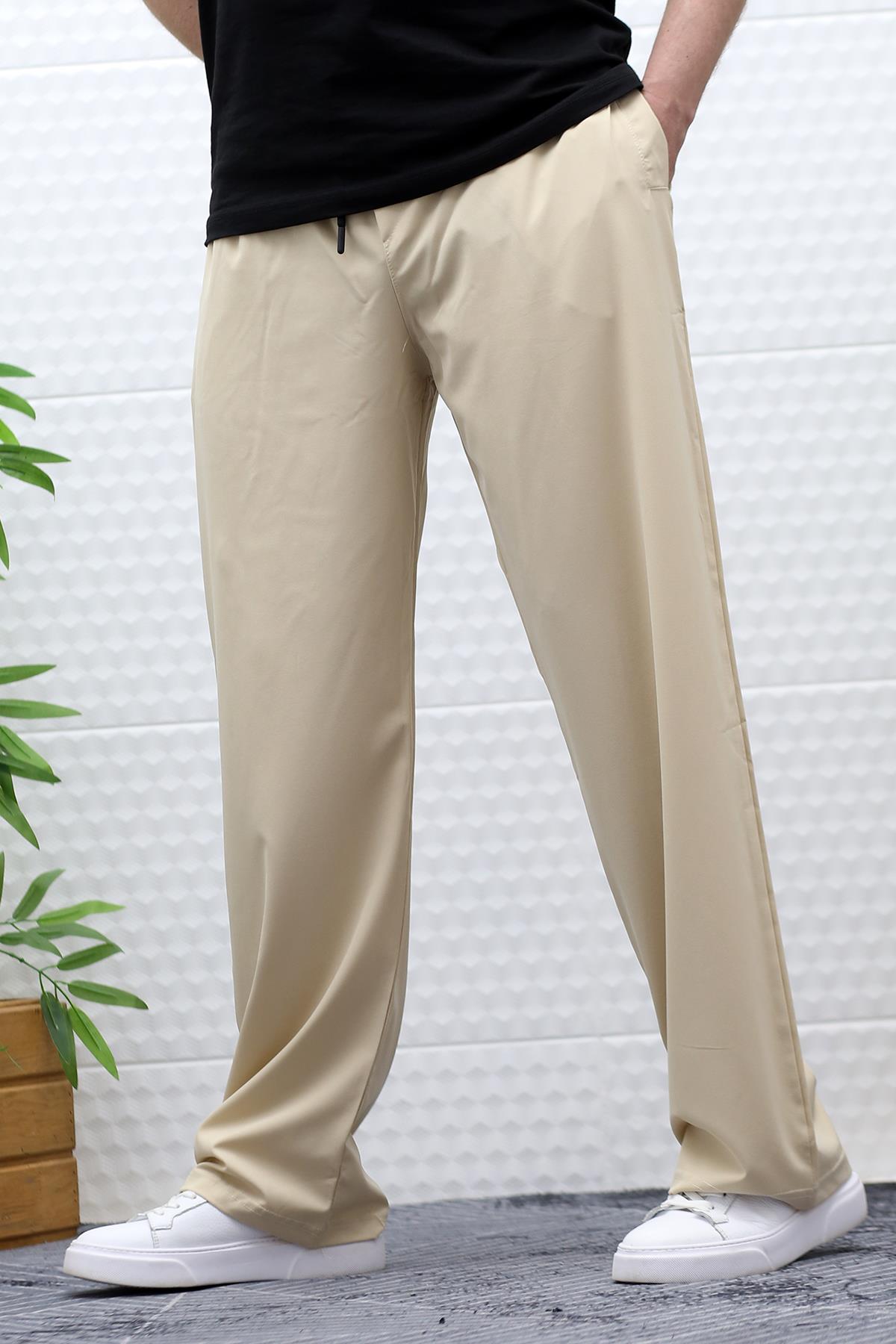 Erkek Likralı Baggy Pantolon Düz Paça Paraşüt Kumaş Pantolon - Bej
