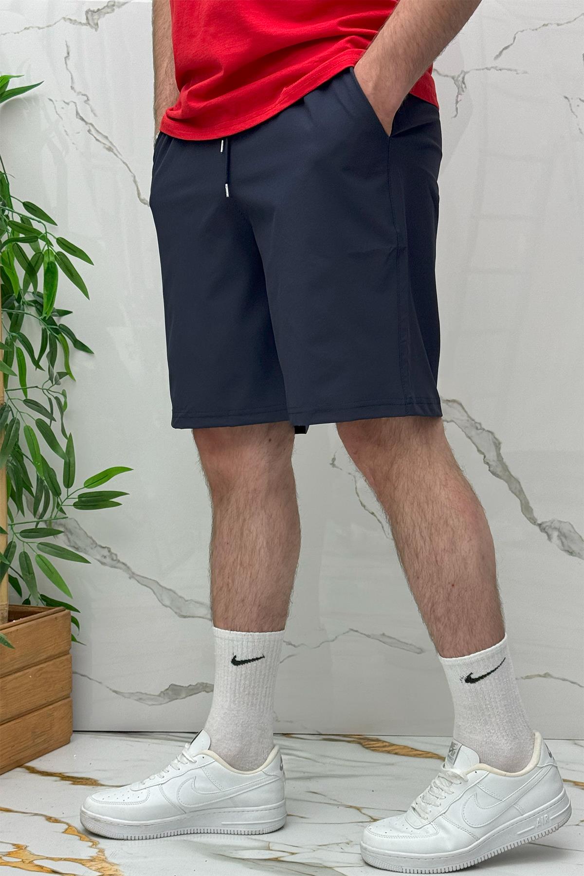 Erkek Likralı Rahat Kesim Tiril Tiril Paraşüt Kumaş Şort - Lacivert