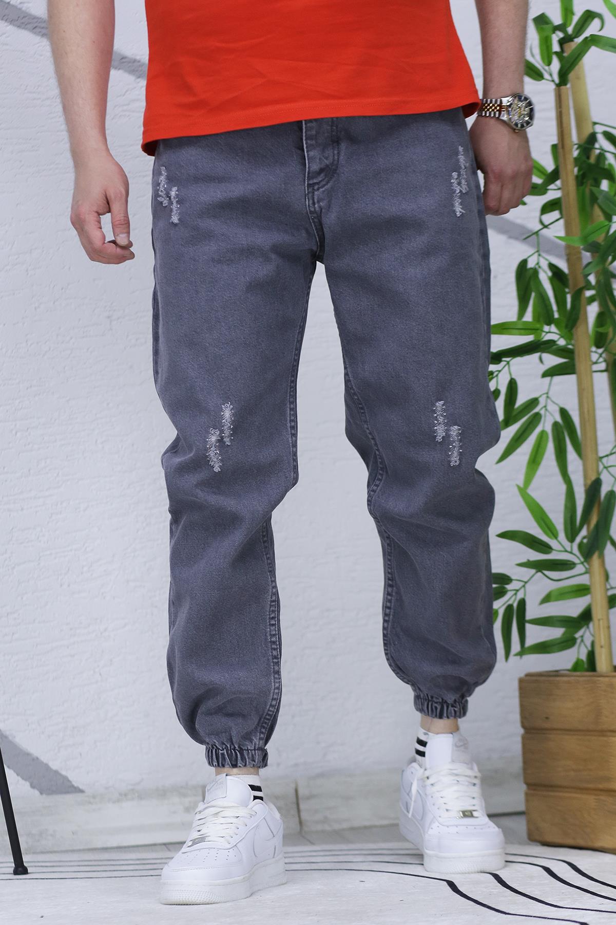 Erkek Paçası Lastikli Tırnaklı Boyfiren Kot Pnt. 646 - Füme