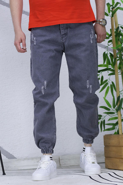 Erkek Paçası Lastikli Tırnaklı Boyfiren Kot Pnt. 646 - Füme