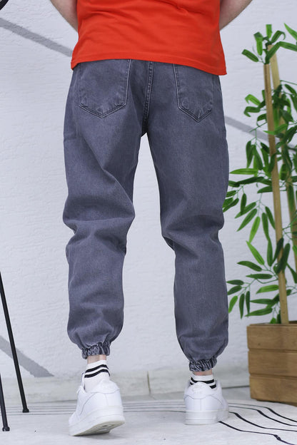 Erkek Paçası Lastikli Tırnaklı Boyfiren Kot Pnt. 646 - Füme