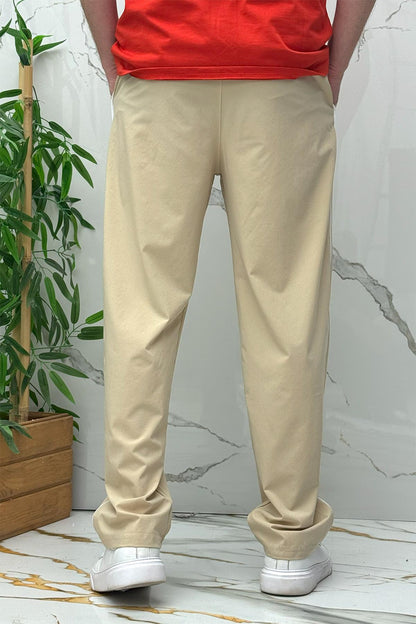 Erkek Yanları Biyeli Reflektör Baskılı Paraşüt Kumaş Baggy Pantolon - Bej